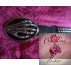 Studded belt with glitter skeleton hand buckle